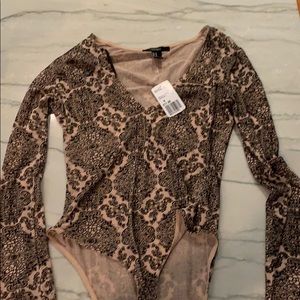 Peach/nude and black body suit NWT